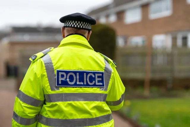 Police officer in high-visibility jacket representing firearms licensing enforcement pressures linked to the Home Office knife licensing consultation